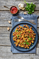 ground beef stew of potatoes and chopped tomatoes
