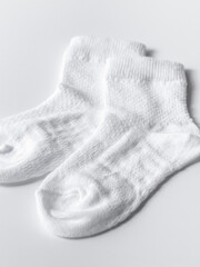 Cotton white socks flat lay. Clothing production, sewing workshop