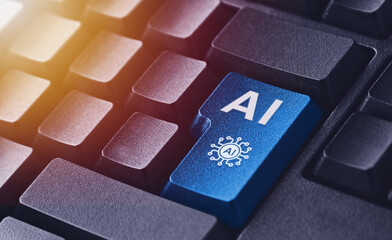 Computer with AI (Artificial Intelligence) button on keyboard.