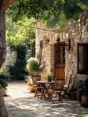 Fototapeta premium The stone walls and wooden furniture in the small courtyard of the farmhouse