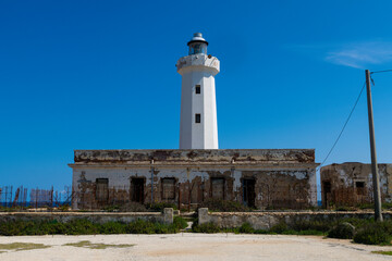 White Lighthouse and Ruins near Syracuse Coastline