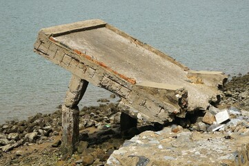 old abandoned jetty on beach