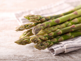 raw asparagus on kitchen towel