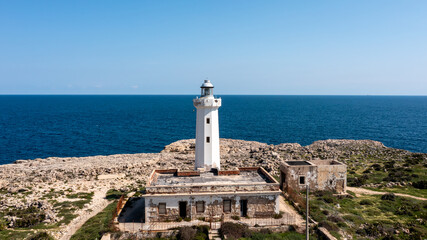 Lighthouse on rugged coast near Syracuse