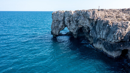 Coastal rock arch and cliffs near Syracuse, Elephant rock