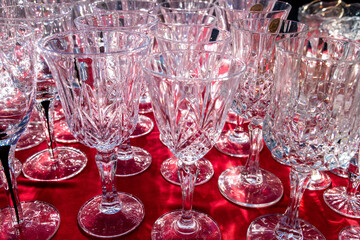 Crystal Wine Glasses on Red Fabric Surface