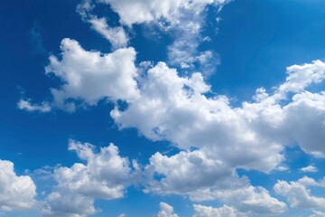 Fototapeta premium Serene Cumulus Cloudscape: A Vivid Blue Sky