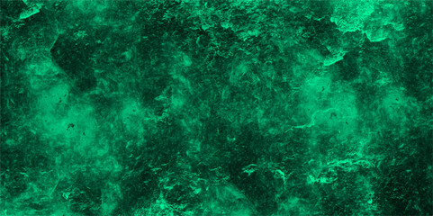 Abstract texture of a deep green, cloudy background with stormy sky or turbulent cosmic nebula. Soft blending between darker forest green areas and lighter emerald or jade. Vivid, moody, atmosphere