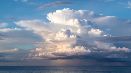 Obraz premium Majestic Cumulus Clouds Over Serene Ocean A Breathtaking View of Nature's Grandeur