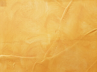 Close-up of orange cement wall, loft style, dark background concept or wallpaper for background illustration.