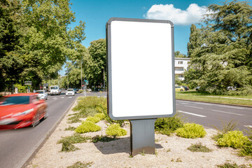 Large vertical billboard mockup on roadside with traffic - mockup