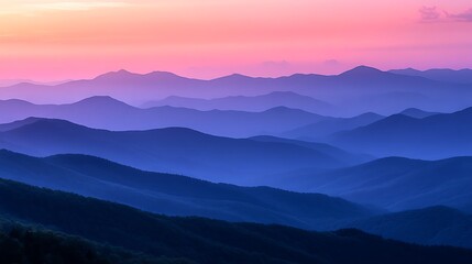 Obraz premium Layered Blue Ridge Mountains at Dawn with Pink Sky and Gentle Haze