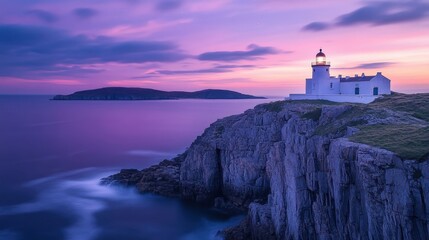 Stunning sunset view of a lighthouse on a rocky cliff by the sea, surrounded by calm waters and colorful skies at dusk.