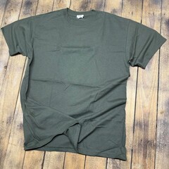 Vintage style t-shirt mockup with an aged 90s look stretched on rustic wood