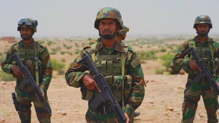 Indian Soldiers in Alert Mode with Guns
