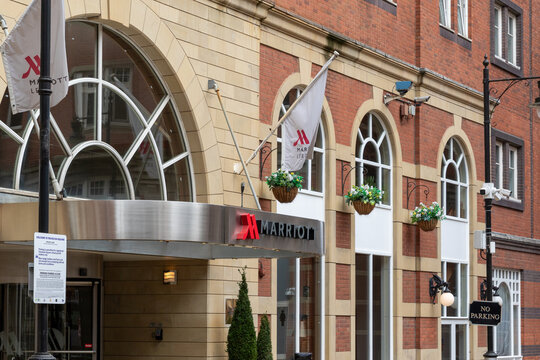 Marriott Hotel Exterior Facade with Signage and Flags in Leeds, UK.