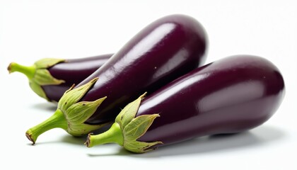 Fresh raw ripe aubergines isolated on white background. Violet eggplants with green stems. Healthy organic vegetarian food ingredient for cooking. Diet. Macro photo.