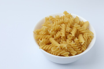 Raw pasta isolated on a white background, contour.