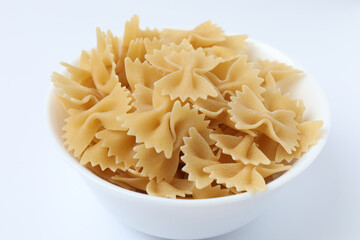 Raw pasta isolated on a white background, contour.
