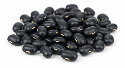 A Close-Up Shot of a Pile of Raw Black Beans, Highlighting Their Rich Dark Color and Smooth Texture, Perfect for Culinary and Food-Related Projects
