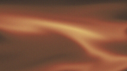 blurred abstract background featuring brown, orange.like light in the dark