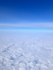 Naklejka premium A tranquil sea of clouds moving infinitely above an endless plain.