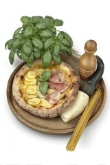 pizza served on wooden plate isolated on white