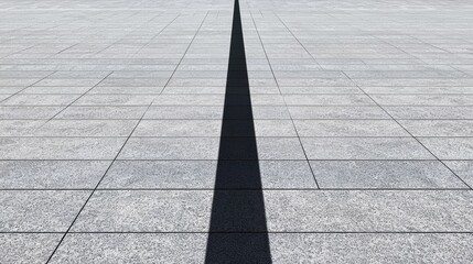 A black line bisects a gray stone floor.