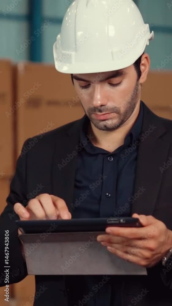 Poster factory manager using tablet computer in warehouse or factory . industry and supply chain management