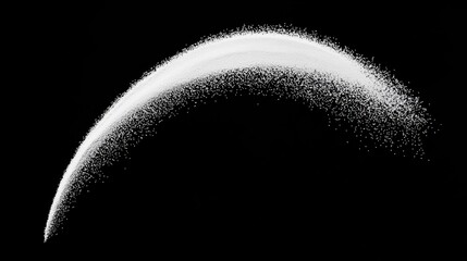 A white powdery substance is shown against a black background.