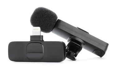 Lavalier microphones and wireless receiver isolated on white