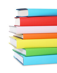 Stack of colorful books on white background