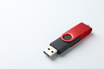 One flash drive on white background, closeup