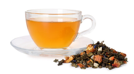 Delicious herbal tea in glass cup and dry leaves isolated on white