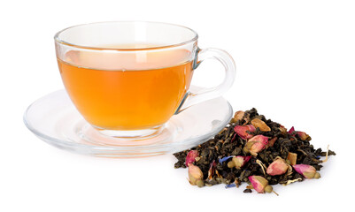 Delicious herbal tea in glass cup and dry leaves isolated on white