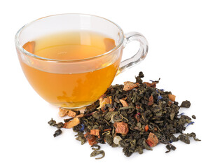 Delicious herbal tea in glass cup and dry leaves isolated on white
