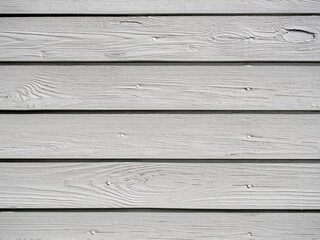 Obraz premium Close-up of gray painted wooden board texture, showcasing smooth surface and grain.