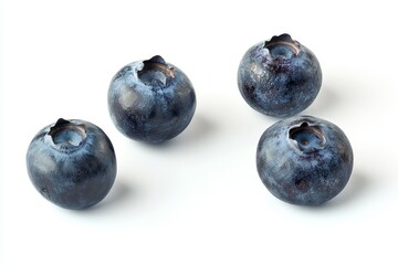 Fototapeta premium Fresh Blueberries on White Background - Four ripe blueberries, plump and juicy, symbolize freshness, health, antioxidants, sweetness, and nature's bounty. A perfect for food blogs or healthy recipes