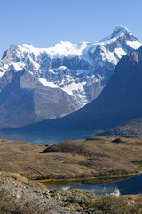 Patagonia, Torres del Paine, Chile. Tourist destination, autumn, April. Snow, mountains, lake, beautiful nature landscape.