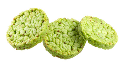 Three wasabi rice crackers levitating on transparent background