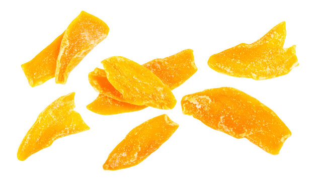 Freeze dried mango chunks hovering on transparent background