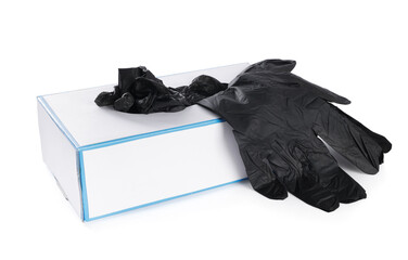 Black medical gloves and box isolated on white