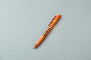 One stylish pen on grey background, top view