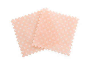 Samples of fabrics with polka dot pattern isolated on white, top view