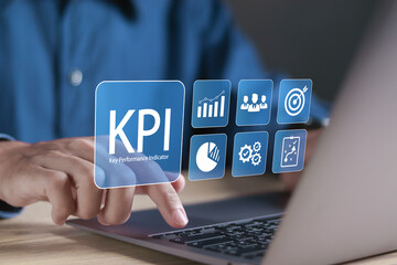 KPI Key Performance Indicator concept. Create reports with KPIs, metrics connected to databases, finance, operations, sales, marketing. Person using laptop with KPI icons.