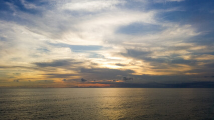 beautiful dramatic landscape of sunset on the sea beach
