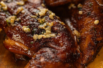 Closeup of roasted grilled whole chicken served at restaurant