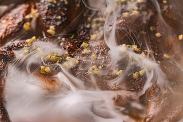 Closeup of roasted grilled whole chicken served at restaurant