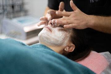 girl at a cosmetologist during treatment procedures