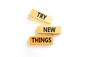 Try new things symbol. Concept words Try new things on beautiful wooden block. Beautiful white...